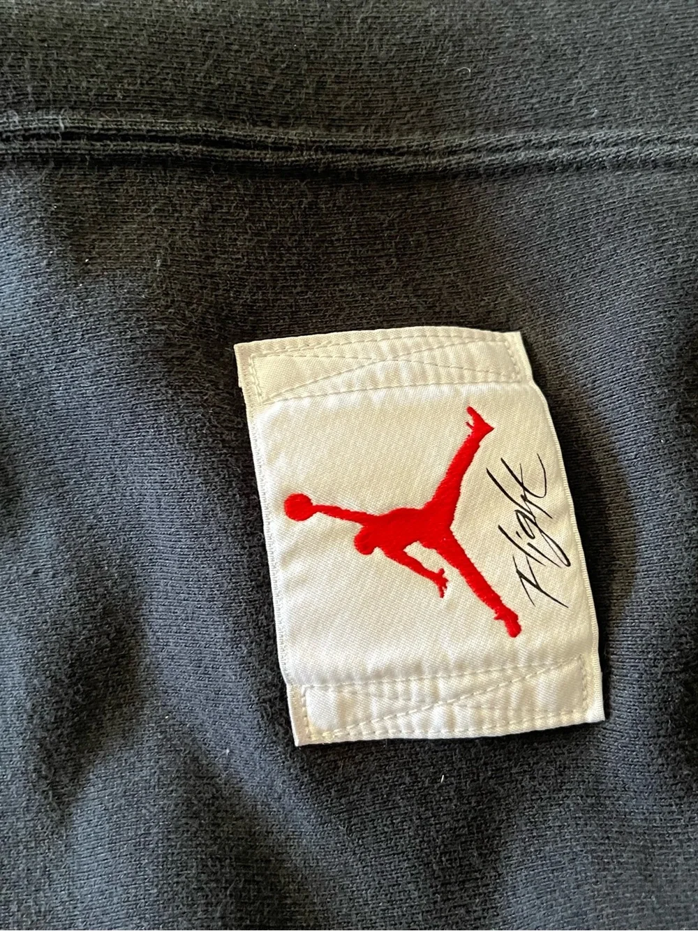 Air Jordan flight fleece pants, sweats joggers black with “flight” patch on leg